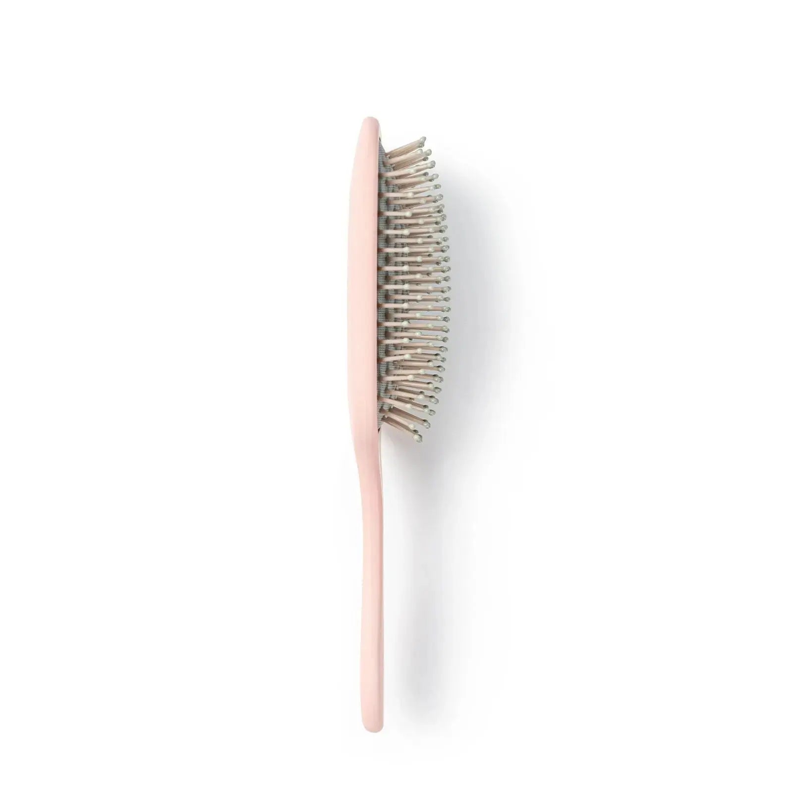 TYMO pink paddle brush – side angle view